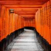 Red Torii gates in Fushimi Inari shrine in Kyoto Japan